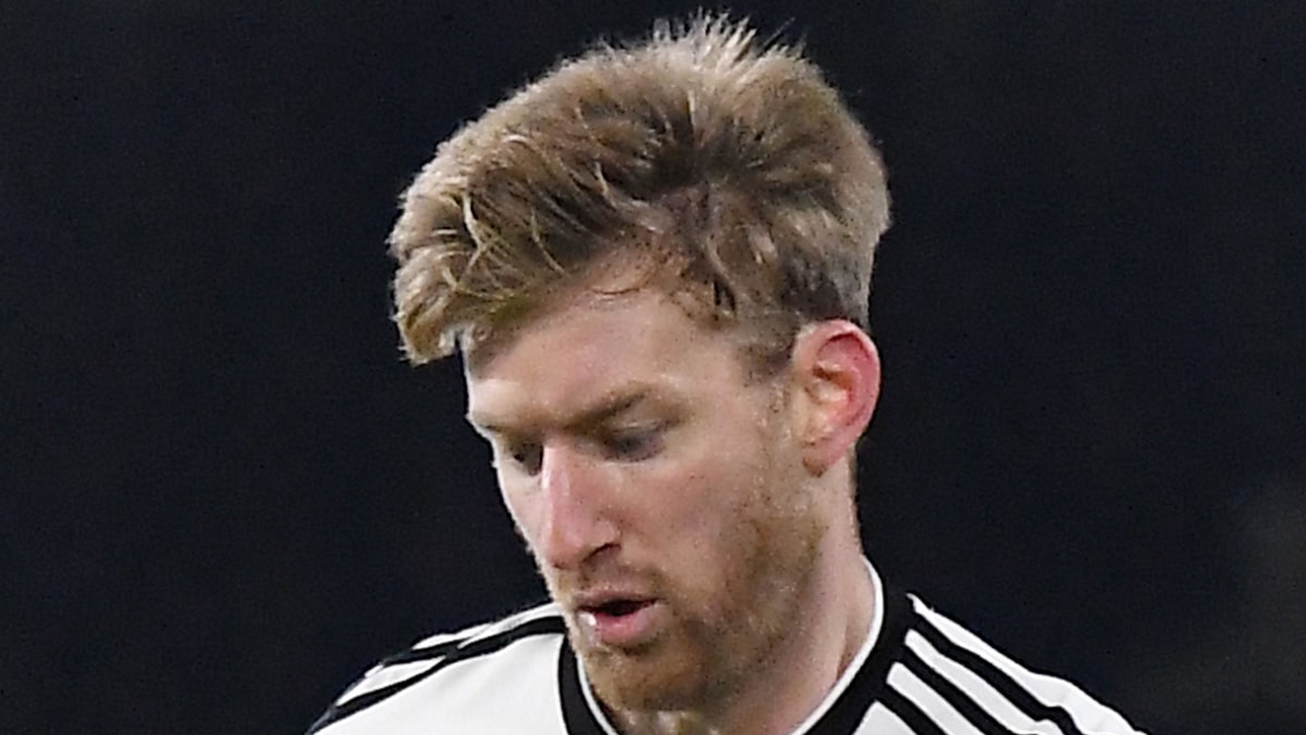 Tim Ream playing football