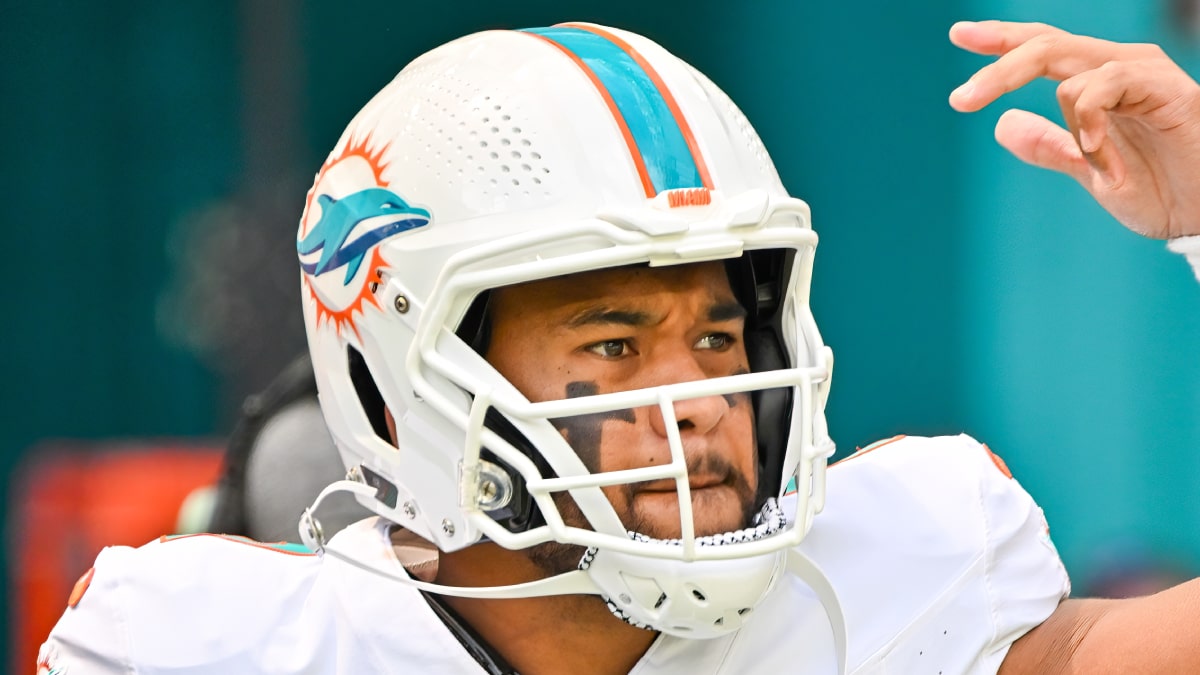 Tua Tagovailoa playing NFL American football for the Miami Dolphins