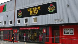 The Racecourse Ground home of Wrexham football club showing a sign for Wrexham Lager