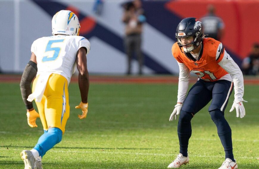 Denver Broncos cornerback Riley Moss defending Los Angeles Chargers wide reciever Joshua Palmer