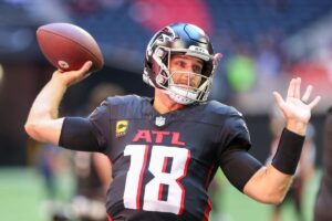 Atlanta Falcons quarterback Kirk Cousins throws a football during warm-ups.