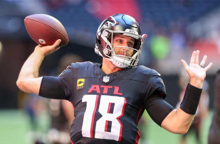 Atlanta Falcons quarterback Kirk Cousins throws a football during warm-ups.