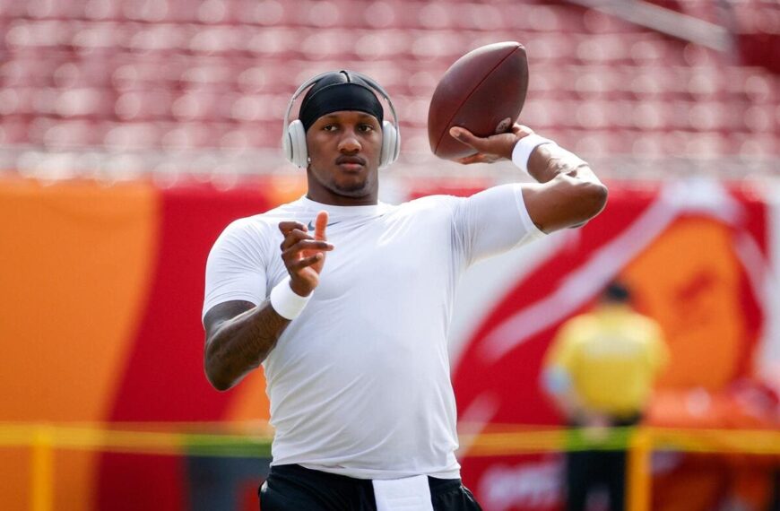 Atlanta Falcons quarterback Michael Penix Jr. warming up before a game begins.