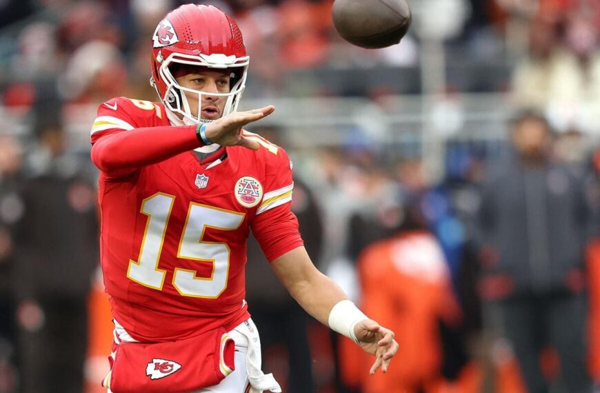 Kansas City Chiefs quarterback Patrick Mahomes throws a pass during a football game.