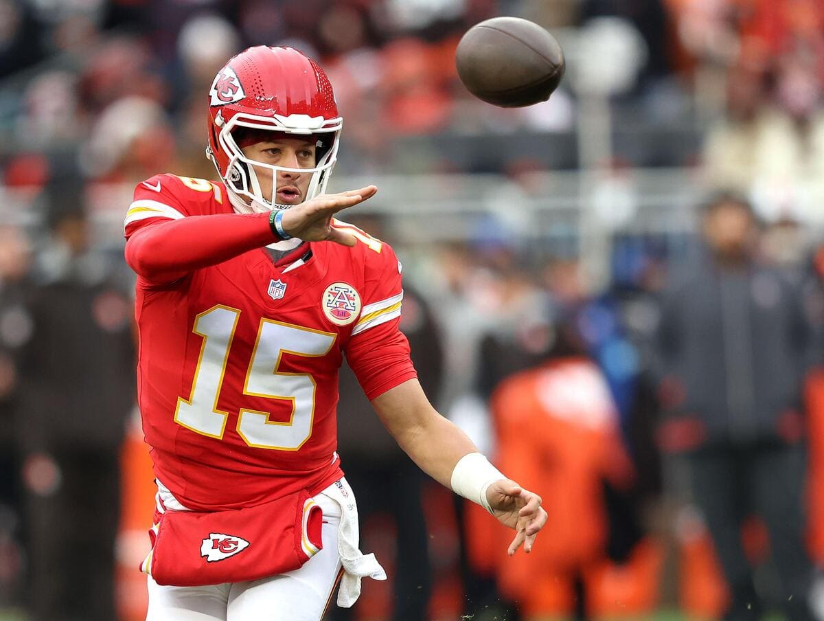 Kansas City Chiefs quarterback Patrick Mahomes throws a pass during a football game.