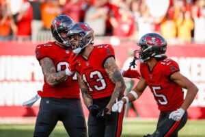 Tampa Bay Buccaneers wide receiver Mike Evans celebrates with teammates.