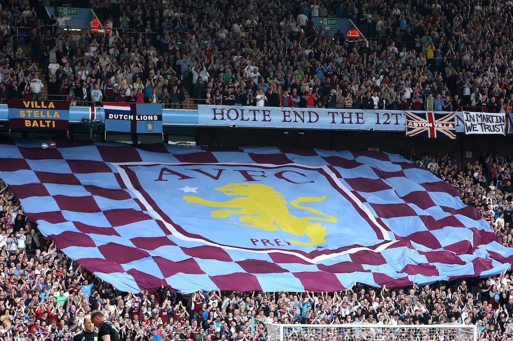 Soccer - Barclays Premier League - Aston Villa v Birmingham City - Villa Park. Aston Villa fans in the Holte end with a giant flag - Image ID: GCFE80