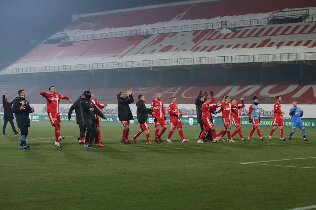 AC Monza players celebrate on front of the empty home end after the final whistle in the Serie B match at U-Power Stadium, . Picture date: 30th December 2020. Picture credit should read: Jonathan Moscrop/Sportimage via PA Images - Image ID: 2GHH66Y