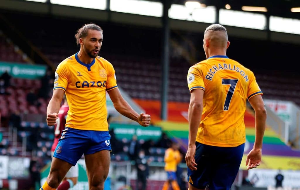 BURNLEY, ENGLAND - DECEMBER 05: Dominic Calvert-Lewin of Everton celebrates with teammate Richarlison after scoring his team's first goal during the Premier League match between Burnley and Everton at Turf Moor on December 05, 2020 in Burnley, England. The match will be played without fans, behind closed doors as a Covid-19 precaution. (Photo by Clive Brunskill/Getty Images)