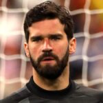 Liverpool goalkeeper Alisson Becker playing football