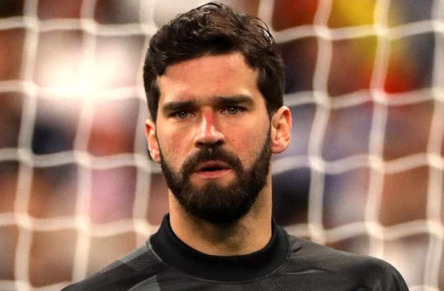 Liverpool goalkeeper Alisson Becker playing football