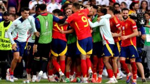 Spain football team celebrate a goal
