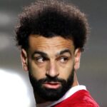 Mohamed Salah playing football for Liverpool