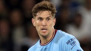 John Stones playing football for Man City