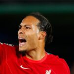 Virgil van Dijk playing football for Liverpool