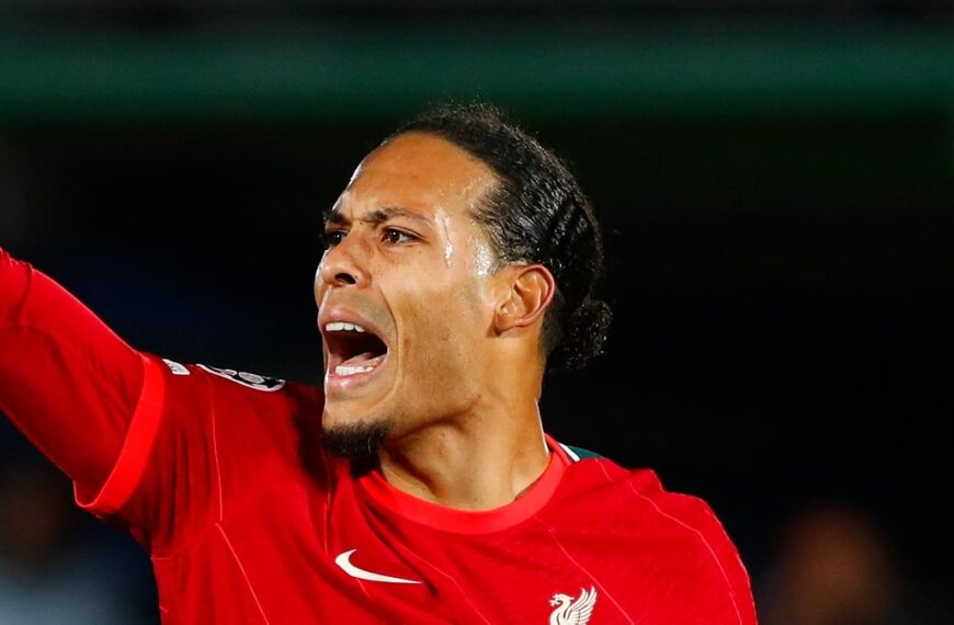 Virgil van Dijk playing football for Liverpool