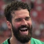 Goalkeeper Alisson Becker playing football for Liverpool