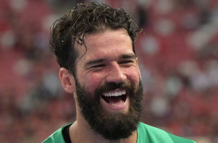 Goalkeeper Alisson Becker playing football for Liverpool