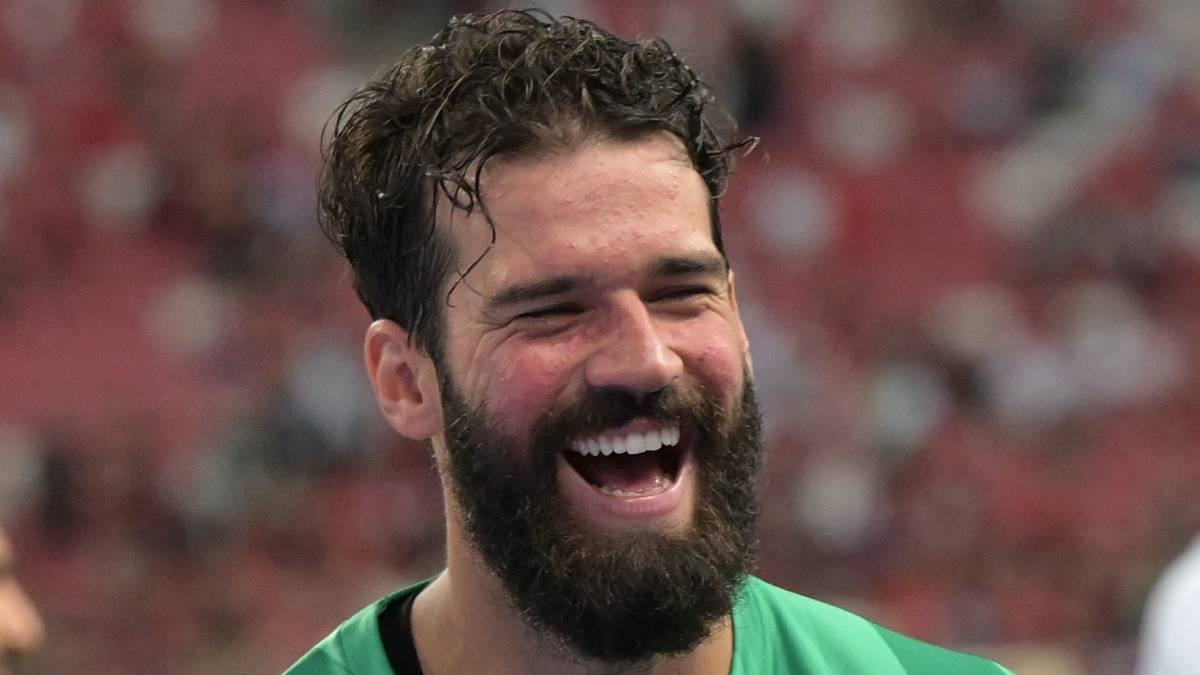 Goalkeeper Alisson, playing football for Liverpool Becker